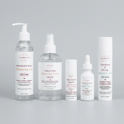 A five-piece skincare set from OAD BELLEZA on a light gray background. The set includes a large pump bottle of Cleansing Gel, a spray bottle of Balancing Toner, a small dropper bottle of Peptide Eye - cream, a small dropper bottle of Peptides, and a tall tube of Peptide Crème.