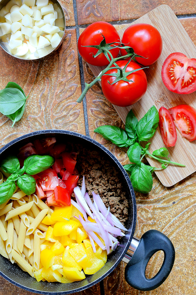 Fresh noodles and vegetables prepped for cooking